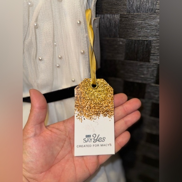 Floor-sweeping tulle, faux pearls, & a velvet belt pull this gorgeous look - Picture 4 of 6